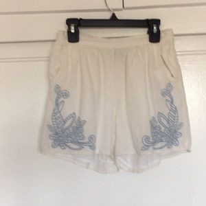 Fancy white shorts with blue accents